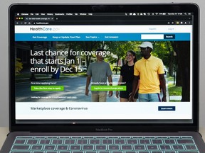 FILE - The healthcare.gov website is seen, on Dec. 14, 2021 in Fort Washington, Md. Millions of people in the United States will be spared from big increases in health care costs next year after President Joe Biden signed legislation extending generous subsidies for those who buy plans through federal and state marketplaces.