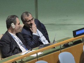 FILE - Iran's delegates look at each other while U.S. Secretary of State Antony J. Blinken addresses the 2022 Nuclear Non-Proliferation Treaty (NPT) review conference, in the United Nations General Assembly, Aug. 1, 2022. Last week's attack on author Salman Rushdie and the indictment of an Iranian national for plotting to murder former national security adviser John Bolton have given the Biden administration new headaches as it attempts to negotiate a return to the 2015 nuclear deal with Iran.