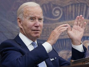 FILE - President Joe Biden speaks about the economy on the White House complex in Washington, July 28, 2022. Biden will sign a modest executive order on Wednesday aimed in part at making it easier for women seeking abortions to travel in between states to obtain access to the procedure.