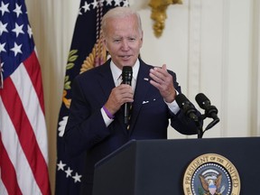 FILE - President Joe Biden speaks during an event in the East Room of the White House, Aug. 10, 2022, in Washington. Biden will host a White House summit next month aimed at combatting a spate of hate-fueled violence in the U.S., as he works to deliver on his campaign pledge to "heal the soul of the nation."