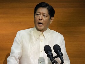 FILE- Philippine President Ferdinand Marcos Jr. delivers his first state of the nation address in Quezon City, Philippines, Monday, July 25, 2022. Marcos Jr. may fire top agricultural officials if an investigation shows that they maliciously decided to import sugar amid a shortage without his approval and then publicized the plan, the press secretary said Thursday Aug. 11. 2022.