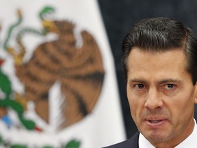 FILE - Mexico's President Enrique Pena Nieto speaks during a joint statement with Republican presidential nominee Donald Trump in Mexico City, Wednesday, Aug. 31, 2016. Mexico's Attorney General's Office said Tuesday, August 2, 2022, that it has opened several lines of investigation against former President Enrique Peña Nieto, several weeks after the country's anti-money laundering agency accused the former leader of handling millions of dollars in possibly illegal funds.