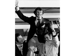 Paul Henderson is shown on shoulders of Alan Eagleson (right) and Tony Esposito at Toronto International Airport following arrival from Moscow following Team Canada's victory over the Soviet Union in 1972 in Sept.,1972. Henderson scored one of the biggest goals in hockey history 50 years ago Wednesday, helping Canada beat the Soviet Union in Game 8 to capture the 1972 Summit Series. THE CANADIAN PRESS/CP