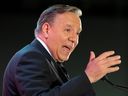 Coalition Avenir du Quebec leader Francois Legault speaks to a Montreal Chamber of Commerce September 28, where he said that accepting more than 50,000 immigrants per year into Quebec would be 