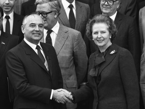 Mikhail Gorbachev, left, shakes hands with Margaret Thatcher in 1984.