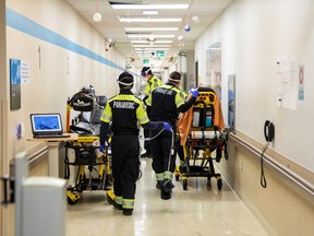 Toronto Paramedics deliver patients to the emergency room at the Humber River Hospital in this January 20 photo.