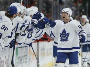 Toronto Maple Leafs defenceman Rasmus Sandin (38) celebrates with teammates after scoring against the Detroit Red Wings during the third period of an NHL hockey game Saturday, Jan. 29, 2022, in Detroit. The&ampnbsp;Leafs have signed Sandin to a two-year contract extension, the club announced on Thursday.&ampnbsp;THE CANADIAN PRESS/AP/Duane Burleson