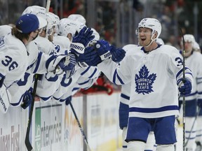 Toronto Maple Leafs defenceman Rasmus Sandin (38) celebrates with teammates after scoring against the Detroit Red Wings during the third period of an NHL hockey game Saturday, Jan. 29, 2022, in Detroit. The Leafs have signed Sandin to a two-year contract extension, the club announced on Thursday. THE CANADIAN PRESS/AP/Duane Burleson