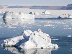 Icebergs are seen from outside Croaker Bay on Devon Island, Canada, on Friday, July 11, 2008.