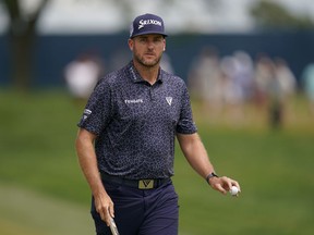 Taylor Pendrith, of Canada, reacts at the first during the final round of the BMW Championship golf tournament at Wilmington Country Club, Sunday, Aug. 21, 2022, in Wilmington, Del.&ampnbsp;Pendrith and Corey Conners have been named to the international team at the upcoming Presidents Cup.THE CANADIAN PRESS/AP/Julio Cortez