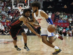 Detroit Pistons' Isaiah Livers drives against Portland Trail Blazers' Shaedon Sharpe during the first half an NBA summer league basketball game Thursday, July 7, 2022, in Las Vegas. Sharpe's rise to being one of the more intriguing rookies to look out for in the NBA has been meteoric.