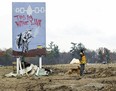 An Mohawk protester camps out at a construction site at the centre of an Indigenous land dispute in Caledonia, Ont., on October 29, 2020.