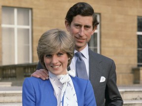 Prince Charles And Lady Diana Spencer publicly announce their engagement at Buckingham Palace on February 24, 1981.