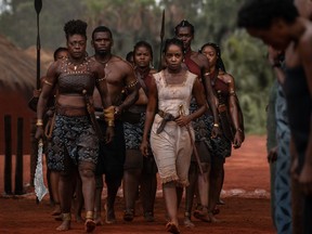 At front, from left, Viola Davis and Thuso Mbedu in The Woman King.