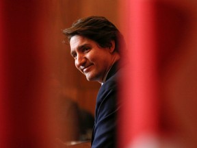 Prime Minister Justin Trudeau attends a news conference to announce that the Emergencies Act is being revoked, in Ottawa on Feb. 23.