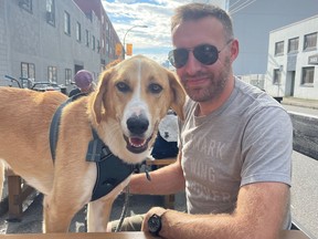 Lucky with his Vancouver foster dad Owen Laukkanen.