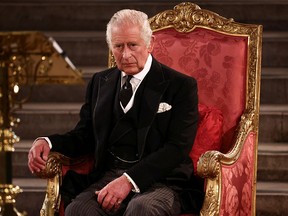 King Charles III looks on in Westminster Hall before addressing the Houses of Parliament on Sept. 12, 2022.