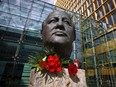 Roses are placed on a sculpture of Mikhail Gorbachev in memory of the final leader of the Soviet Union, at the "Fathers of Unity" memorial in Berlin, Germany August 31, 2022.