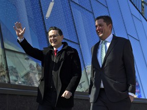 Conservative MPs Pierre Poilievre and Andrew Scheer walk together in Ottawa in April 2022. Scheer is a favourite to be in Poilievre's inner circle if Poilievre wins the party leadership.
