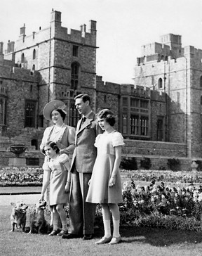 Princess Elizabeth with family and dogs at Windsor Castle in 1939.