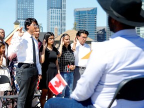 An in-person citizenship ceremony at the Calgary Stampede in July, 2022.