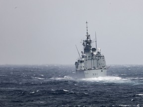 In this handout photo courtesy of the US Navy taken on Sept. 20, 2022 the Royal Canadian Navy Halifax-class frigate HMCS Vancouver (FFH 331) transits the Taiwan Strait with guided-missile destroyer USS Higgins.