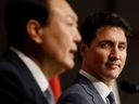 Prime Minister Justin Trudeau listens to South Korean President Yoon Suk-yeol during a news conference in Ottawa on Sept. 23, 2022. Yoon is aiming to cut coal dust emissions by over 30 per cent in Korea. As the world’s fourth-largest producer of natural gas, Canada is in a position to help, writes Rahim Mohamed.