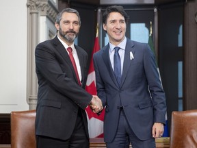 Prime Minister Justin Trudeau meets with Yukon Premier Sandy Silver, Friday Dec. 6, 2019 at Trudeau's office in Ottawa. Yukon's government has announced it will be joining the federal government and other provinces in observing a national day of mourning to coincide with the state funeral of Queen Elizabeth II.THE CANADIAN PRESS/Adrian Wyld