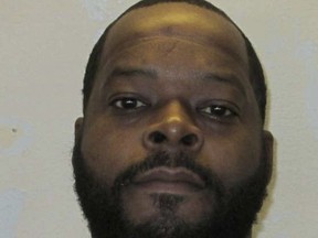This photo provided by the Alabama Department of Corrections in September 2022 shows Toforest Johnson. At 49, he has spent half his life on Alabama's death row for the murder of a sheriff's deputy, a killing he says he did not commit. Johnson's attorneys asked the Alabama Supreme Court on Friday, Sept. 9, 2022, to "right a grievous wrong" and grant him a new trial. (Alabama Department of Corrections)