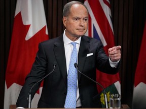 Ontario Finance Minister Peter Bethlenfalvy speaks to the media following the Speech from the Throne at Queen's Park in Toronto, on Tuesday, August 9, 2022.&ampnbsp;Ontario's financial watchdog says the government will save nearly $10 billion through its wage restraint law, though several factors such as inflation could lower that figure. THE&ampnbsp;CANADIAN PRESS/Andrew Lahodynskyj