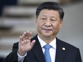 FILE - China's President Xi Jinping greets the media prior to a meeting of leaders of the BRICS emerging economies at the Itamaraty palace in Brasilia, Brazil, on Nov. 14, 2019. Xi has landed Nur-Sultan, Kazakhstan, Wednesday, Sept. 14, 2022, started his first foreign trip abroad since the outbreak of the pandemic ahead of a summit with Russia's Vladimir Putin and other leaders of a Central Asian security group.