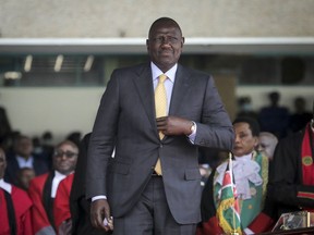 Kenya's new president William Ruto arrives to be sworn in to office at a ceremony held at Kasarani stadium in Nairobi, Kenya Tuesday, Sept. 13, 2022. Ruto said that climate change will be key to the government's agenda and made an ambitious pledge to ramp up clean energy and phase out fossil fuels for electricity by 2030.