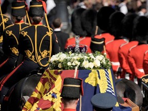 The coffin of Queen Elizabeth II is transported from Buckingham Palace to Westminster Hall in London, Sept. 14.