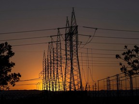 Electrical transmission towers at a Pacific Gas and Electric (PG&E) electrical substation during a heatwave in Vacaville, California, US, on Tuesday, Sept. 6, 2022. California narrowly avoided blackouts for a second successive day even as blistering temperatures pushed electricity demand to a record and stretched the state's power grid close to its limits.