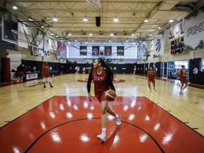 Natalie Achonwa dribbles a ball during Canada's senior women's national team practice in Toronto, Friday, July 8, 2022.
