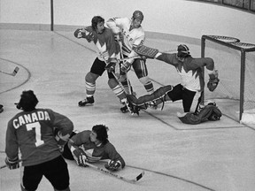 Team Canada goalie Ken Dryden and defenceman Rod Seiling combine to block a scoring attempt by Soviet defenceman Valery Vasiliev in Vancouver, Friday, Sept. 8, 1972. It's been five decades but the moments remain vividly etched in the minds of the men who were part of the eight historic hockey games between Canada and the USSR.
