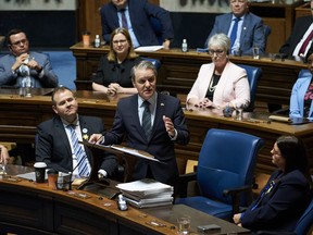 Manitoba Finance Minister Cameron Friesen delivers the 2022 budget in Winnipeg, Man., Tuesday, Apr 12, 2022 at the Manitoba Legislative Building. Manitoba's deficit has come in much lower than expected, thanks to a rebounding economy and higher-than-expected federal transfer payments.