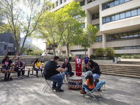 Supporters drum outside court, after a jury found two Alberta men guilty in deaths of Metis hunters Jacob Sansom and his uncle Maurice Cardinal, in Edmonton Alta, on Tuesday May 31, 2022.