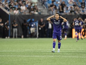 Orlando City midfielder Cesar Araujo (5) reacts during the second half of an MLS soccer match against Charlotte FC, Sunday, Aug. 21, 2022, in Charlotte, N.C.