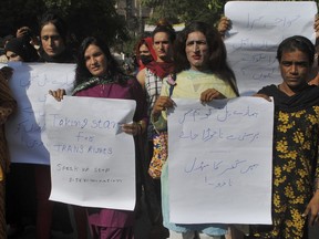 Pakistani transgender persons hold a demonstration demanding for their basic rights, in Hyderabad, Pakistan, Friday, Sept. 30, 2022. Pakistani authorities on Friday in a major move launched a special hotline for the country's largely ignored transgenders in an effort aimed at protecting them from growing incidents of harassment, a government official said.