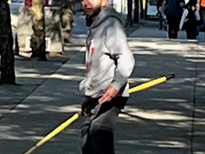 The suspect in an alleged racially motivated attack on an Asian woman in Vancouver on Tuesday Sept. 27, 2022, is seen in an image distributed by the Vancouver Police Department.