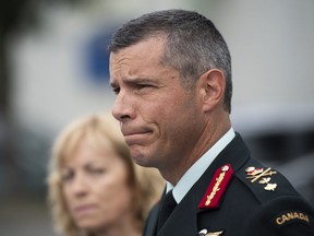 Maj.-Gen. Dany Fortin speaks to reporters outside the Gatineau Police Station after being processed, in Gatineau, Que., on Wednesday, Aug. 18, 2021.