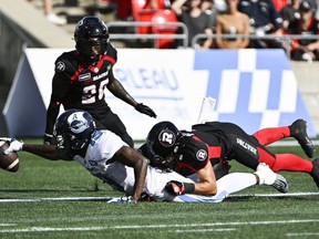 Toronto Argonauts wide receiver Kurleigh Gittens Jr. (19) reaches out to make a touchdown as Ottawa Redblacks defensive back Antoine Pruneau (6) is unable to stop him, during second half CFL football action in Ottawa on Saturday, Sept. 10, 2022. Ottawa (3-9-0) hosts the Toronto Argonauts (7-5-0) Saturday night and will need to be much better than they were two weeks ago when they lost 24-19 to the Argos.