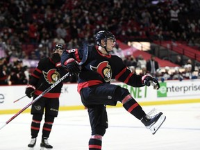 Ottawa Senators Tim Stutzle (18) celebrates his second goal of the game against the Colorado Avalanche during second period NHL hockey action in Ottawa, on Saturday, Dec. 4, 2021. Stutzle has agreed to an eight-year, US$66.8-million contract extension, the team announced Wednesday.THE CANADIAN PRESS/Justin Tang