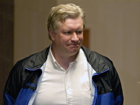 FILE - Alaska Rep. Victor Kohring, R-Wasilla, is led into the Federal Court Room for arraignment in Juneau, Alaska on Friday, May 4, 2007. Kohring, a former Alaska lawmaker who was caught up in a corruption scandal that roiled the state Legislature more than 15 years ago, has died in a vehicle crash.