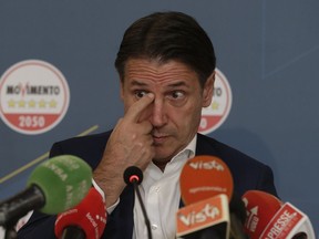 Five Stars Movement leader Giuseppe Conte speaks during a press conference at his electoral headquarters in Rome, early Monday, Sept. 26, 2022. Italians voted in a national election that might yield the nation's first government led by the far right since the end of World War II.