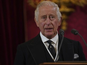Britain's King Charles III before Privy Council members in the Throne Room during the Accession Council at St James's Palace on Saturday.