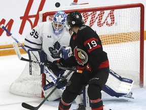 Toronto Maple Leafs goaltender Ilya Samsonov (35) makes a save as Ottawa Senators right wing Drake Batherson (19) looks on during second period NHL pre-season action at the CAA arena in Belleville, Ont., on Friday, Sept. 30, 2022.