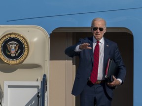 President Joe Biden waves before boarding Air Force One at Andrews Air Force Base, Md., en route a trip to New York to attend the United Nations General Assembly, Tuesday, Sept. 20, 2022.