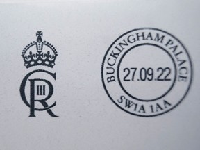 Envelopes franked with the new cypher of King Charles III 'CIIIR' are pictured after being printed in the Court Post Office at Buckingham Palace in central London on September 27, 2022 - Buckingham Palace on Monday revealed King Charles III's new royal cypher -- the monogram of his initials that will feature on government buildings, state documents and new post boxes. His late mother Queen Elizabeth II's cypher was EIIR, standing for Elizabeth II Regina (queen in Latin). Charles's will be CIIIR for Charles III Rex (king in Latin), with the C intertwined with the R, the III within the R, and the crown above both letters.